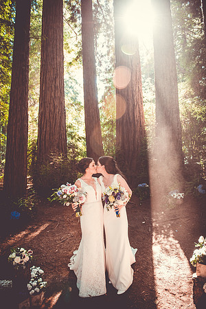 Brides kissing wedding Jackson Hole